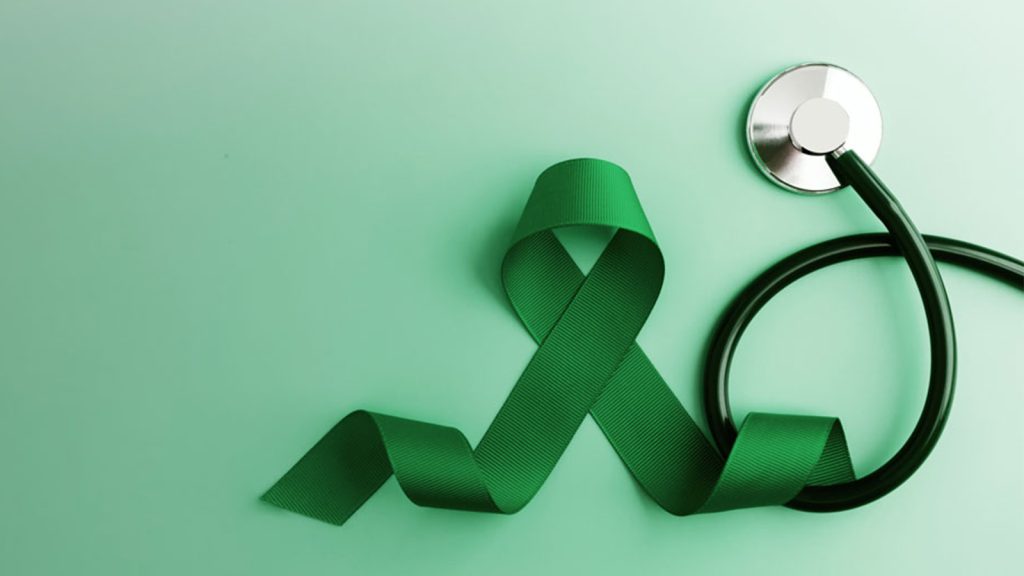 Green ribbon and stethoscope