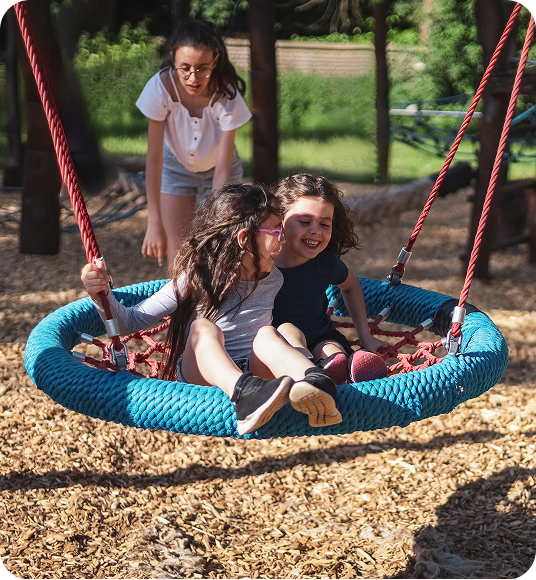 Children Playing on a swing